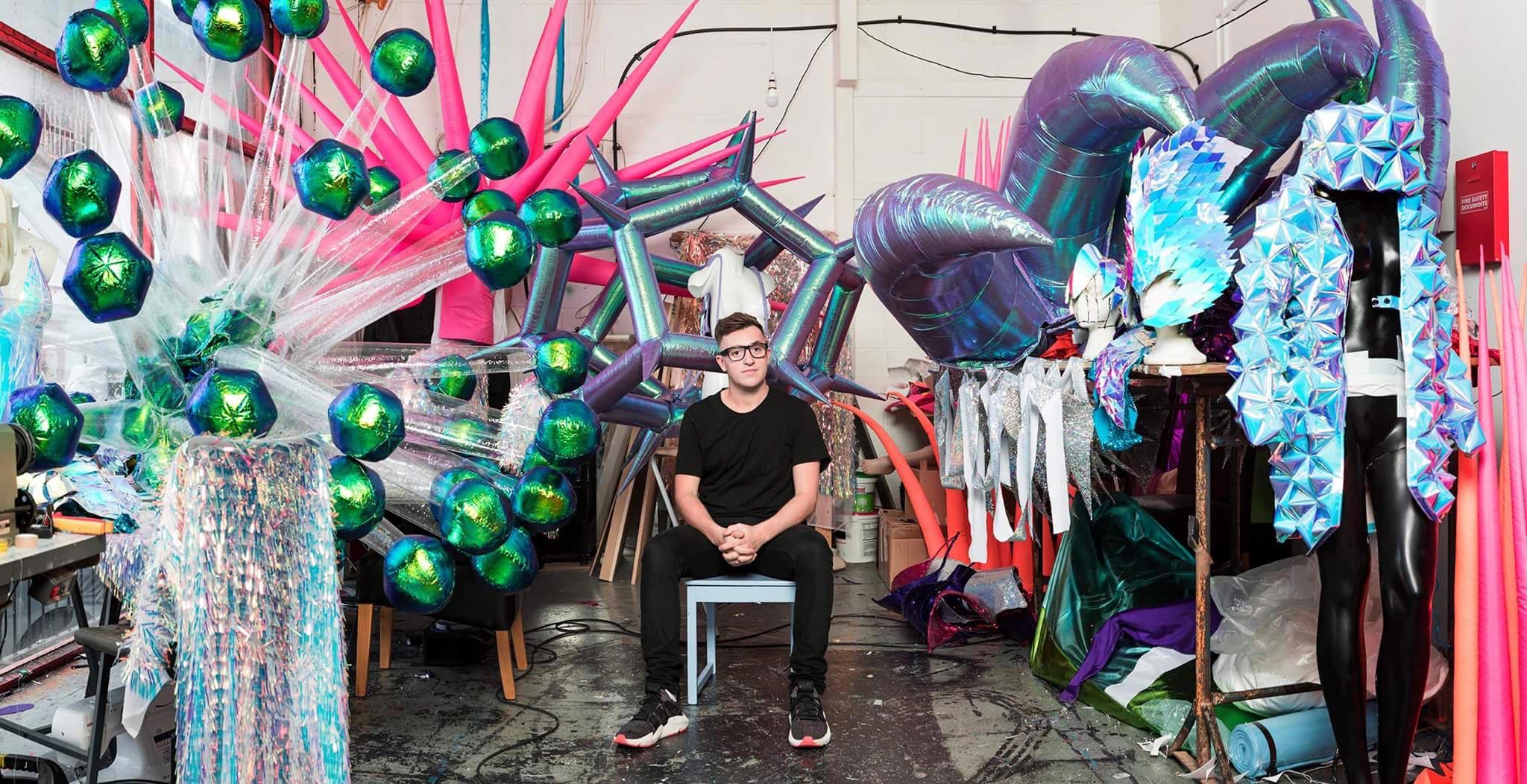 Jack Irving in his studio, surrounded by wild and wonderful designs 
